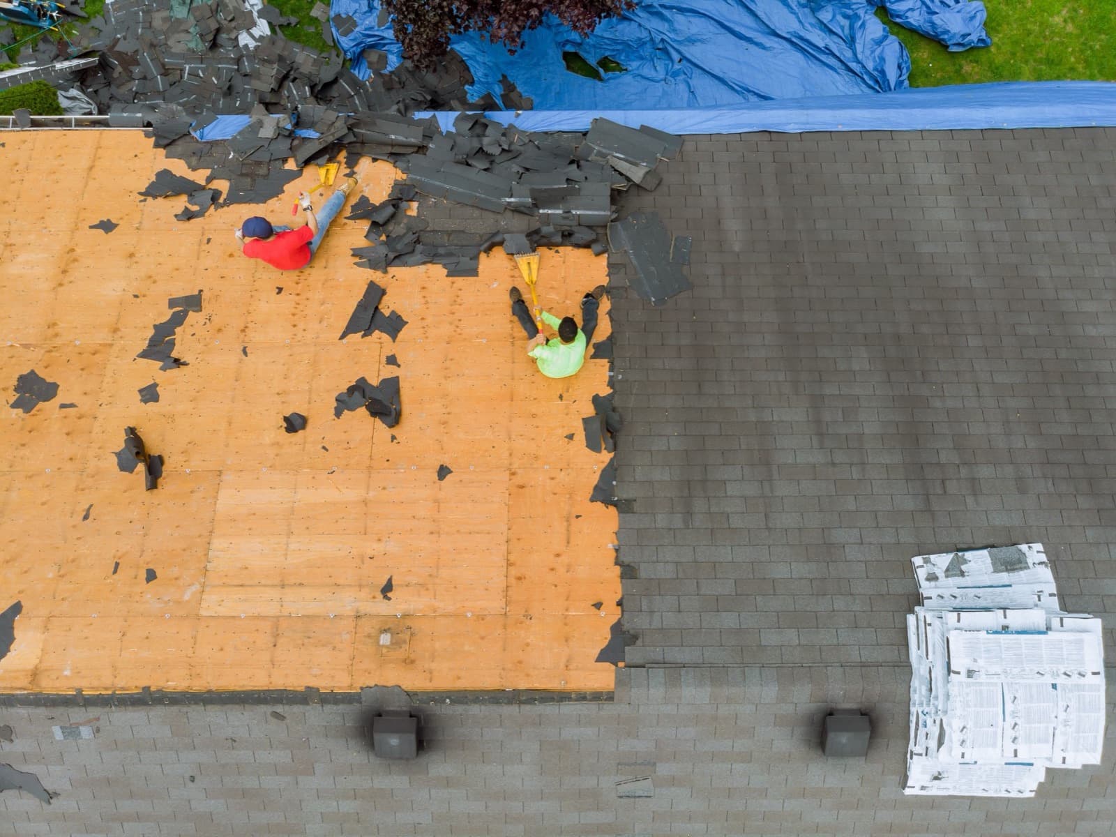Removal of old roof replacement with new shingles.